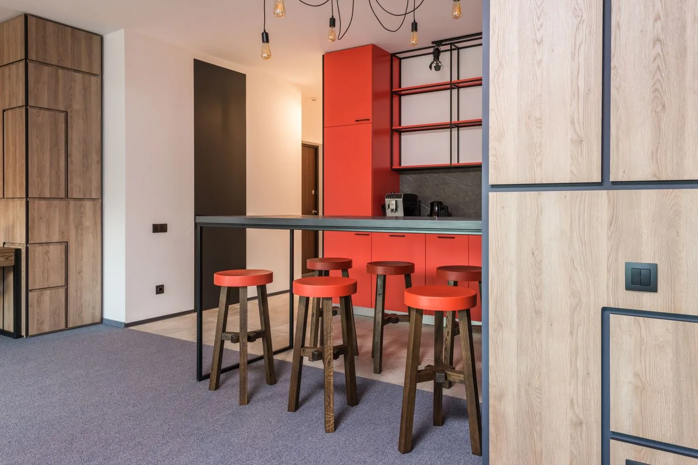A contemporary kitchen with a clean, simple layout