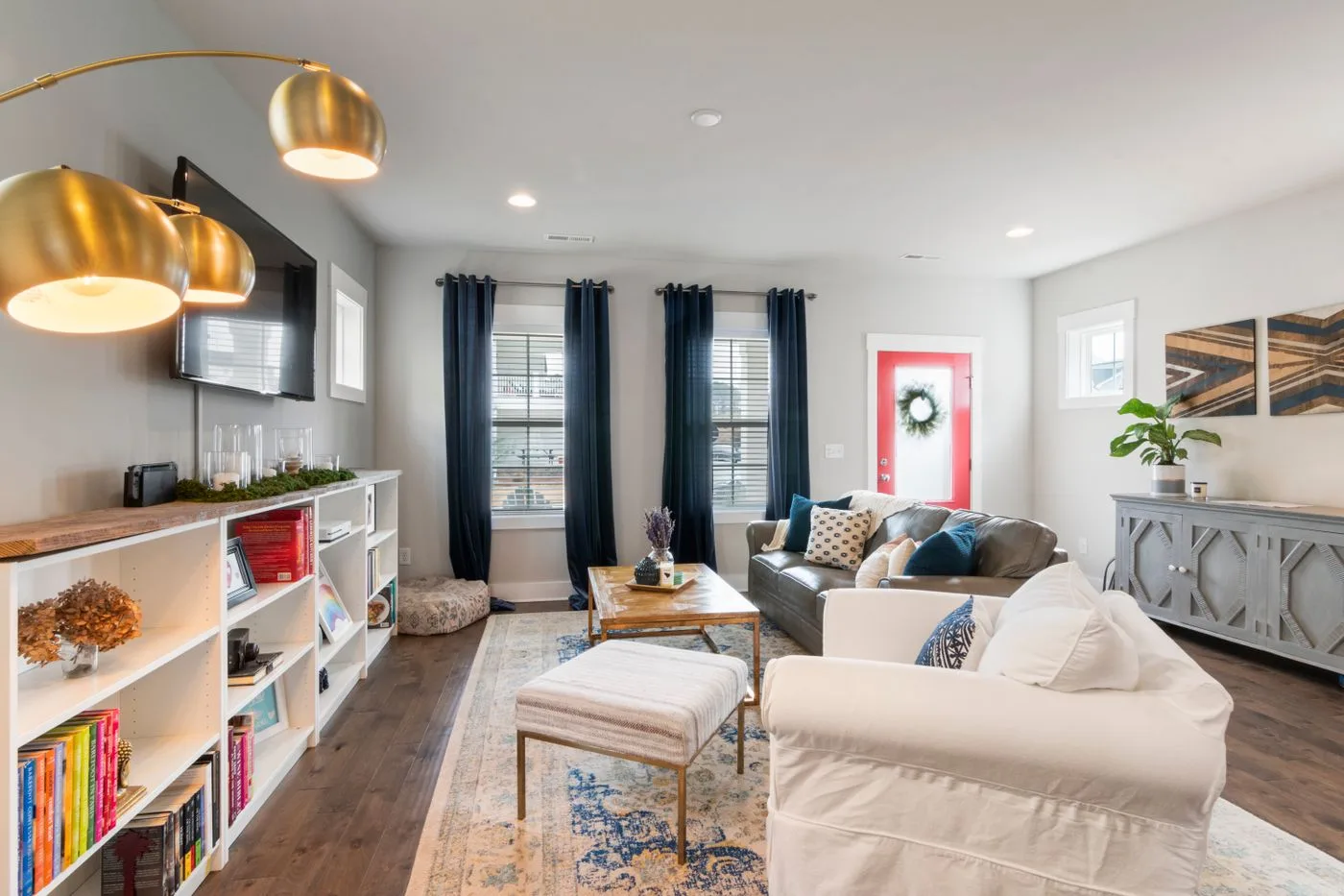A light-filled living room with neutral furnishings
